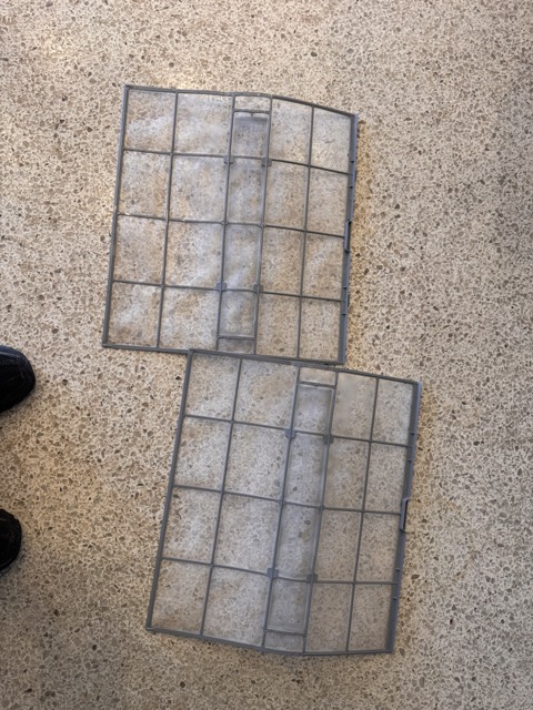 AC filters laid out during a deep clean