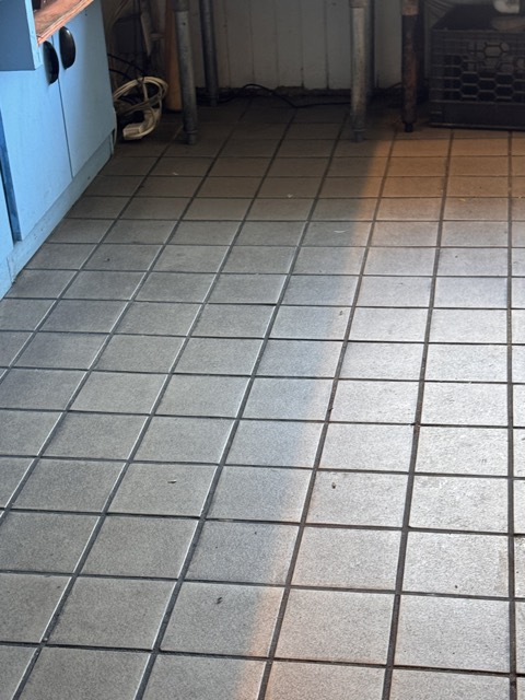 Commercial kitchen tile floor after scrubbing