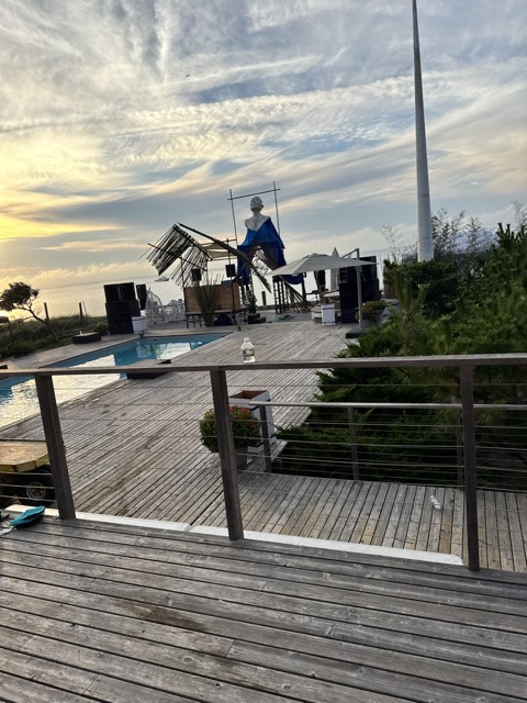 Pool deck and railing at sunset after cleanup