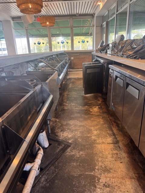 Restaurant kitchen line before a deep clean