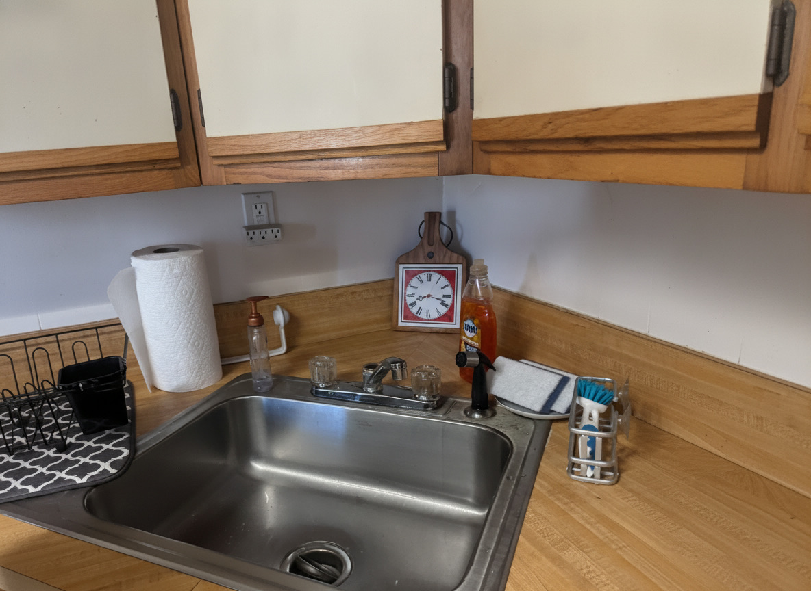 Kitchen sink after cleaning, polished stainless steel
